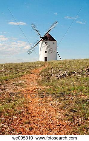 Path and windmill. Mota del Cuervo, Cuenca province, Castilla La Mancha, Spain. View Large Photo Image Stock Image - Path and windmill. Mota del Cuervo, Cuenca province, Castilla La Mancha, Spain.. Fotosearch