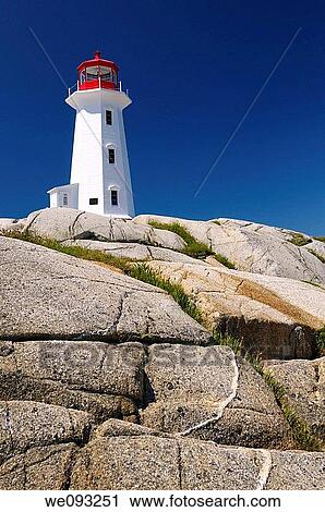 Peggys Cove lighthouse on smooth granite rocks against a blue sky Nova Scotia View Large Photo Image Stock Image - Peggys Cove lighthouse on smooth granite rocks against a blue sky Nova Scotia. Fotosearch