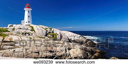 Peggys Cove Nova Scotia lighthouse on worn granite rocks with accordian player tourists and surf View Large Photo Image Stock Photo - Peggys Cove Nova Scotia lighthouse on worn granite rocks with accordian player tourists and surf. Fotosearch