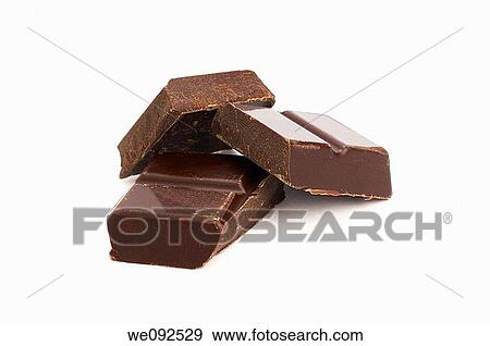 Pieces of dark chocolate View Large Photo Image Stock Photo - Pieces of dark chocolate. Fotosearch