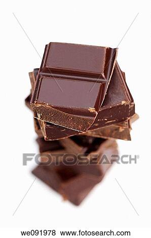 Pile of dark chocolate View Large Photo Image Stock Photo - Pile of dark chocolate. Fotosearch