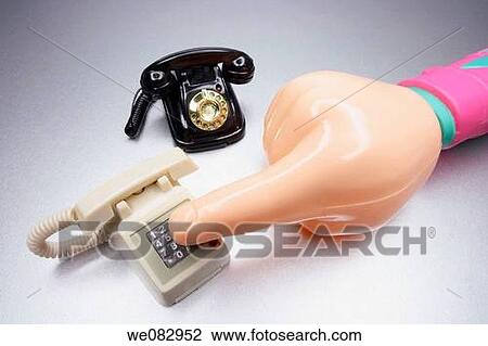 Plastic Hand with Miniature Phones View Large Photo Image Stock Image - Plastic Hand with Miniature Phones. Fotosearch