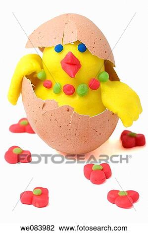 Plasticine figurines. Female chick in egg shell. View Large Photo Image Stock Image - Plasticine figurines. Female chick in egg shell.. Fotosearch