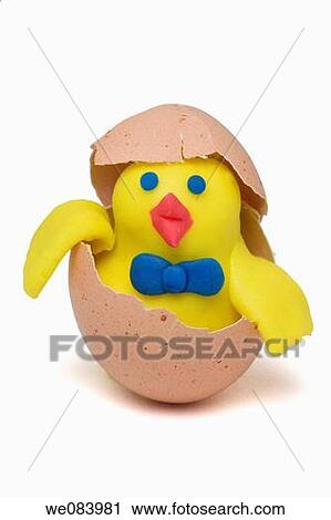 Plasticine figurines. Male chick in egg shell. View Large Photo Image Stock Image - Plasticine figurines. Male chick in egg shell.. Fotosearch