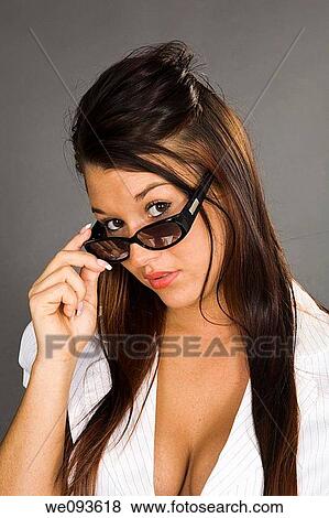 Portrait of a beautiful Caucasian teenager posing on a gray background View Large Photo Image Stock Photo - Portrait of a beautiful Caucasian teenager posing on a gray background. Fotosearch