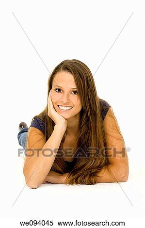 Portrait of a Caucasian woman laying on a white background View Large Photo Image Stock Photography - Portrait of a Caucasian woman laying on a white background. Fotosearch