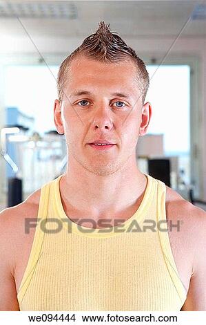 portrait of a young athletic man in modern gym View Large Photo Image Picture - portrait of a young athletic man in modern gym. Fotosearch