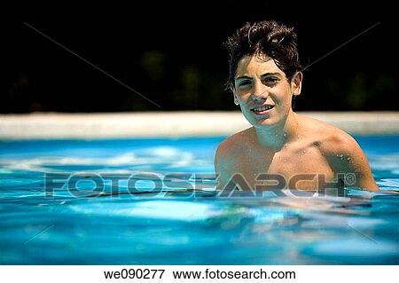 portrait of a young teenager in a swimming pool View Large Photo Image Stock Photo - portrait of a young teenager in a swimming pool. Fotosearch
