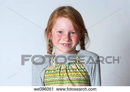 Portrait of average american 2nd grade middle school aged kids, looking at camera and smiling in studio white background View Large Photo Image Stock Image - Portrait of average american 2nd grade middle school aged kids, looking at camera and smiling in studio white background. Fotosearch