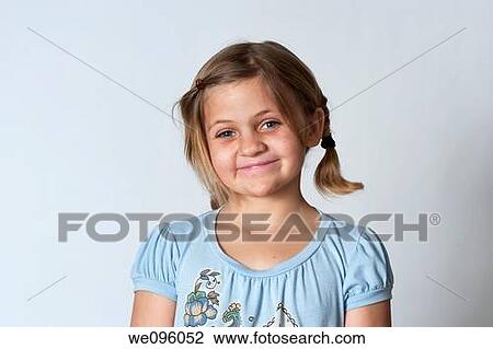 Portrait of average american 2nd grade middle school aged kids, looking at camera and smiling in studio white background View Large Photo Image Stock Image - Portrait of average american 2nd grade middle school aged kids, looking at camera and smiling in studio white background. Fotosearch