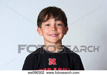 Portrait of average american 2nd grade middle school aged kids, looking at camera and smiling in studio white background View Large Photo Image Stock Image - Portrait of average american 2nd grade middle school aged kids, looking at camera and smiling in studio white background. Fotosearch