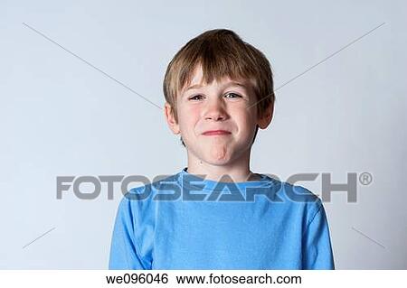 Stock Photograph - Portrait of average american 2nd grade middle school aged kids, looking at camera and smiling in studio white background. Fotosearch