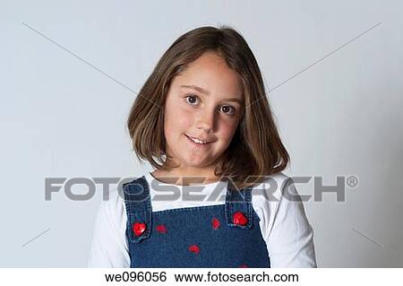 Portrait of average american 2nd grade middle school aged kids, looking at camera and smiling in studio white background View Large Photo Image Stock Photograph - Portrait of average american 2nd grade middle school aged kids, looking at camera and smiling in studio white background. Fotosearch