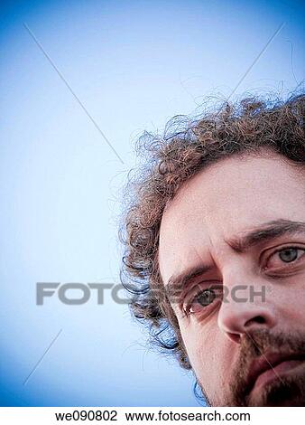 Stock Image - Portrait of young man. Fotosearch