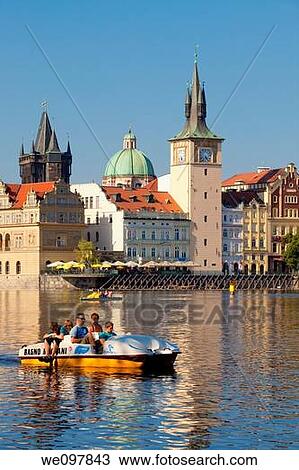Stock Image - prague - novotneho lavka, smetanovo museum, towers of the old town and boats. Fotosearch