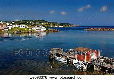 Quiet water of Twillingate Harbour Newfoundland with lobster traps on dock and village houses View Large Photo Image Stock Photograph - Quiet water of Twillingate Harbour Newfoundland with lobster traps on dock and village houses. Fotosearch