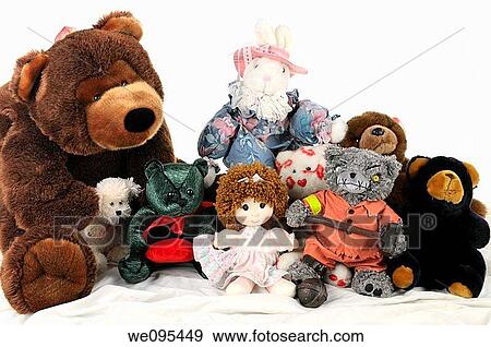 Raggedy Ann with stuffed animals on the bed with one nasty teddybear View Large Photo Image Stock Photo - Raggedy Ann with stuffed animals on the bed with one nasty teddybear. Fotosearch