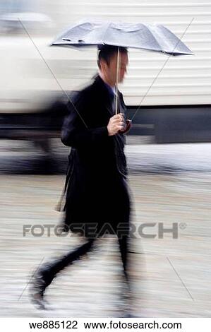 Stock Image - rain in Grand? Place, Brussels, Belgium. Fotosearch