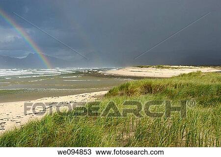 Rainbow on Ocean by cloudy day, Hermanus, South Western Cape, South Africa View Large Photo Image Stock Image - Rainbow on Ocean by cloudy day, Hermanus, South Western Cape, South Africa. Fotosearch