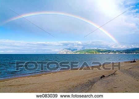 Rainbow over beach, Laredo, Cantabria, Spain View Large Photo Image Stock Photo - Rainbow over beach, Laredo, Cantabria, Spain. Fotosearch