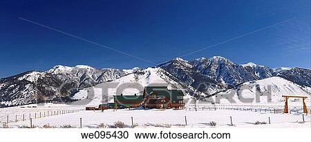 Ranch house in Idaho with Black Mountain of the Madison Range of the Rocky Mountains in winter View Large Photo Image Stock Image - Ranch house in Idaho with Black Mountain of the Madison Range of the Rocky Mountains in winter. Fotosearch