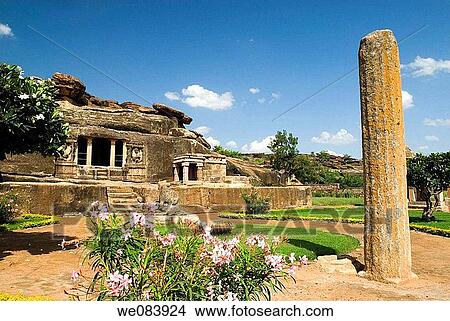 Ravanaphadi Cave temple (6th century) in Aihole, Karnataka. Ravanaphadi Cave in Aihole, Karnataka, is a rock cut temple, with a rectangular shrine, with two mantapas in front of it and a rock cut Shivalingam. This temple dates back to the 6th century. Thi View Large Photo Image Picture - Ravanaphadi Cave temple (6th century) in Aihole, Karnataka. Ravanaphadi Cave in Aihole, Karnataka, is a rock cut temple, with a rectangular shrine, with two mantapas in front of it and a rock cut Shivalingam. This temple dates back to the 6th century. Thi. Fotosearch