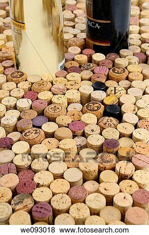 Red and White wine bottles surrounded by a collection of used wine corks View Large Photo Image Stock Photo - Red and White wine bottles surrounded by a collection of used wine corks. Fotosearch