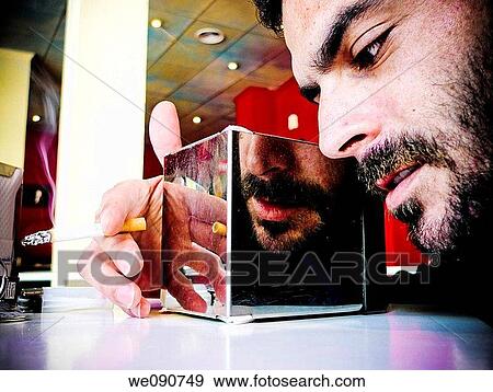 Reflections of a man smoking View Large Photo Image Stock Photo - Reflections of a man smoking. Fotosearch