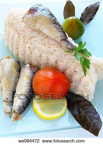 Rice with sardines and tomato View Large Photo Image Stock Image - Rice with sardines and tomato. Fotosearch