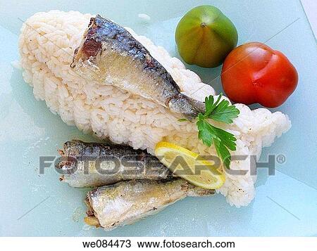 Rice with sardines and tomato View Large Photo Image Stock Image - Rice with sardines and tomato. Fotosearch