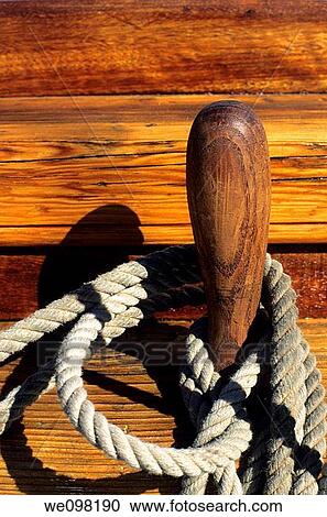 Ropes around the mooring post on an old sailboat View Large Photo Image Stock Image - Ropes around the mooring post on an old sailboat. Fotosearch
