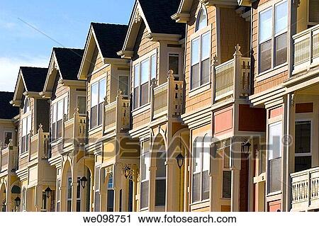 Row houses in the Victorian architecture style with bay windows, balconies, and arched entrances in Santa Cruz, California View Large Photo Image Stock Image - Row houses in the Victorian architecture style with bay windows, balconies, and arched entrances in Santa Cruz, California. Fotosearch