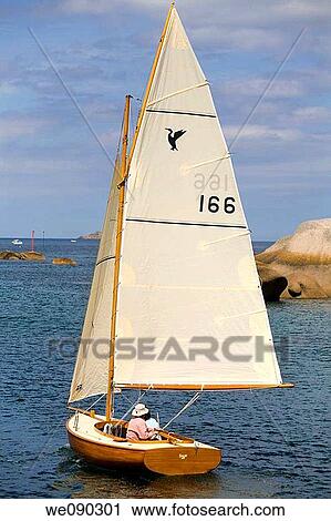 sailing boat. Ploumanach. Pink granite coast. Perros-Guirec (Breton: Perroz-Gireg) is a commune in the C? tes-d? Armor department in Bretagne in northwestern France. View Large Photo Image Stock Image - sailing boat. Ploumanach. Pink granite coast. Perros-Guirec (Breton: Perroz-Gireg) is a commune in the C? tes-d? Armor department in Bretagne in northwestern France.. Fotosearch