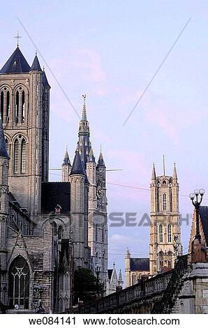 Saint-Nicholas Church, Belfry, and Saint Bavo Cathedral from St Michael's bridge in the evening, Ghent. Flanders, Belgium View Large Photo Image Stock Image - Saint-Nicholas Church, Belfry, and Saint Bavo Cathedral from St Michael's bridge in the evening, Ghent. Flanders, Belgium. Fotosearch