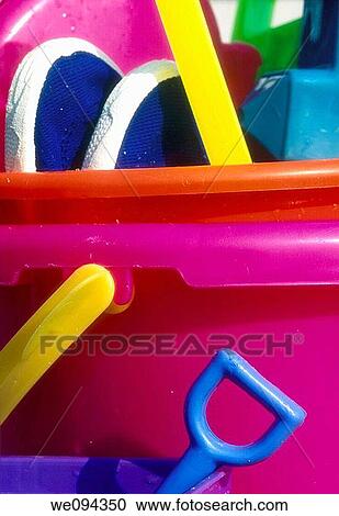 Sand bucket and beach toys View Large Photo Image Stock Image - Sand bucket and beach toys. Fotosearch