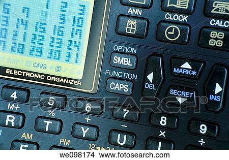 Picture - Screen and keyboard of an electronic organiser. Fotosearch