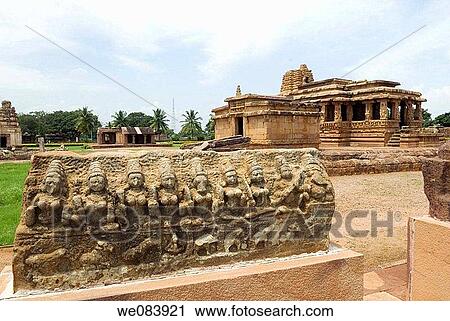 Stock Image - Sculptures in Durga temple complex, Aihole, Karnataka. Aihole, a tranquil village on the banks of the Malaprabha River, is acclaimed as the cradle of Hindu temple architecture. There are about 125 temples divided into 22 groups scattered all over the vill. Fotosearch