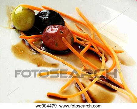 Seasones olives and carrot View Large Photo Image Stock Photo - Seasones olives and carrot. Fotosearch