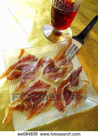 Serrano ham and red wine View Large Photo Image Stock Photo - Serrano ham and red wine. Fotosearch