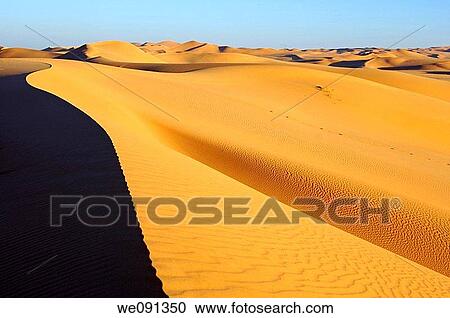 Sharp crest and sand structures in the sand dunes of Erg Muzurq, Sahara desert, Libya View Large Photo Image Stock Image - Sharp crest and sand structures in the sand dunes of Erg Muzurq, Sahara desert, Libya. Fotosearch
