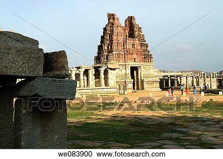 Shri Vijayavitthala Temple in Hampi, Karnataka. The construction of this temple started during the reign of King Krishna Deva Raya in the year 1513 AD. The project was so colossal that the additions continued for almost five decades until the Empire fell View Large Photo Image Stock Image - Shri Vijayavitthala Temple in Hampi, Karnataka. The construction of this temple started during the reign of King Krishna Deva Raya in the year 1513 AD. The project was so colossal that the additions continued for almost five decades until the Empire fell. Fotosearch