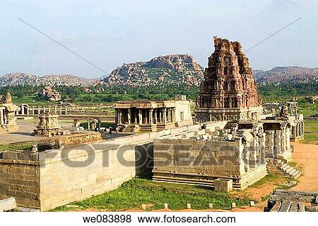 Shri Vijayavitthala Temple in Hampi, Karnataka. The construction of this temple started during the reign of King Krishna Deva Raya in the year 1513 AD. The project was so colossal that the additions continued for almost five decades until the Empire fell View Large Photo Image Stock Photo - Shri Vijayavitthala Temple in Hampi, Karnataka. The construction of this temple started during the reign of King Krishna Deva Raya in the year 1513 AD. The project was so colossal that the additions continued for almost five decades until the Empire fell. Fotosearch