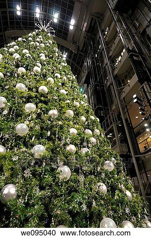 Silver balls on an oversized Christmas tree at the Eaton Centre shopping mall elevators in Toronto View Large Photo Image Stock Image - Silver balls on an oversized Christmas tree at the Eaton Centre shopping mall elevators in Toronto. Fotosearch