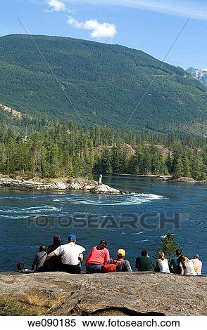 Skookumchuck Narrows, British Columbia, Canada, hikers watching the tidal rapids View Large Photo Image Stock Photography - Skookumchuck Narrows, British Columbia, Canada, hikers watching the tidal rapids. Fotosearch