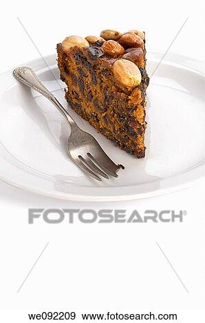 Slice of Dundee Cake View Large Photo Image Stock Photo - Slice of Dundee Cake. Fotosearch