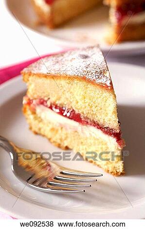 Stock Photo - Slice of Victoria Sponge Cake. Fotosearch