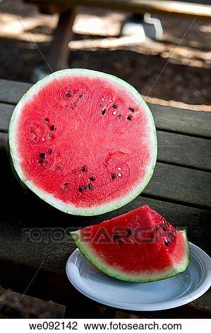 Sliced watermelon on a table View Large Photo Image Stock Image - Sliced watermelon on a table. Fotosearch