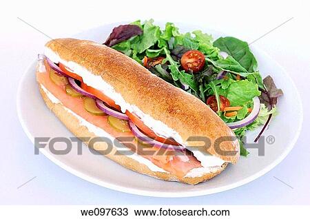 Smoked Salmon sandwich served with salad View Large Photo Image Stock Image - Smoked Salmon sandwich served with salad. Fotosearch