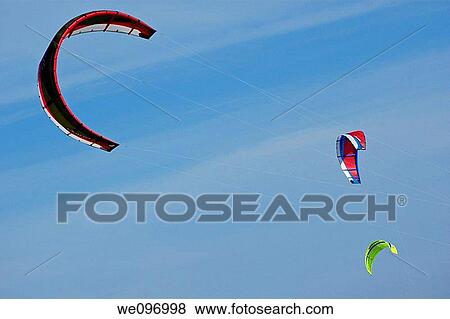 Spain Tarifa three kite surf sails in the sky View Large Photo Image Stock Photo - Spain Tarifa three kite surf sails in the sky. Fotosearch