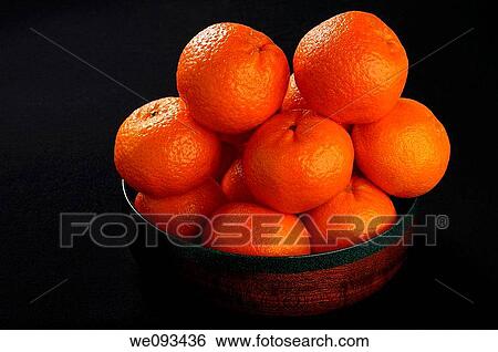 Spanish Clementine Mandarin Oranges in a Mahogany wood bowl on black View Large Photo Image Stock Photograph - Spanish Clementine Mandarin Oranges in a Mahogany wood bowl on black. Fotosearch
